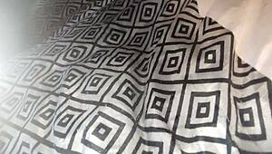 Detailed scene of peeing in bed, capturing the moment of relief and warmth