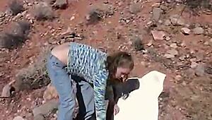 Little April teases outdoors while fingering her hairless body