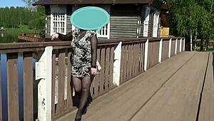 a blonde pornstar walks around flashing her pussy in a solo scene