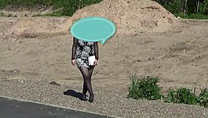 a blonde pornstar walks around flashing her pussy in a solo scene