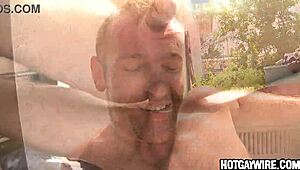 Two hunks engage in anal sex in a dark alley.