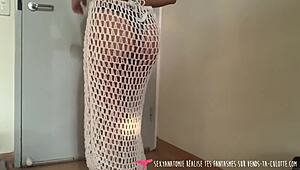 She dances a striptease and masturbates at home