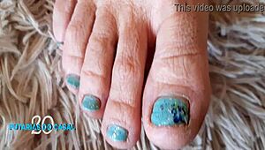 Asian girl masturbates with foot fetish