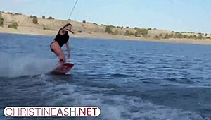 Christine Ash waterskis in the USA with big tits
