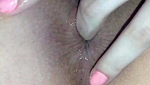 Small-titted amateur takes it up the ass with a dildo