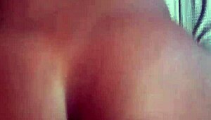 Mistress oils up her slaves for bed play