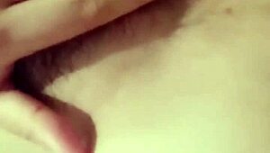 Girl masturbates solo with pussy and tits exposed