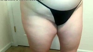 Sheila, the milf wife, rips her clothes while stripping to show those big tits