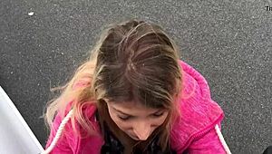 want to see this blonde teen sucking cock outdoors at the parking lot?