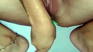 Hot latina babe shaves her pussy in the shower!