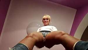 blonde femdom dominates old cuckold in intense bdsm session with whips and chains