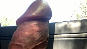 Watch a big cock in close-up in the car