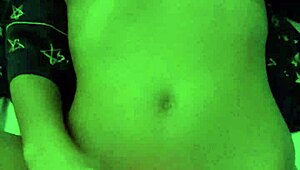 Amateur woman demonstrates toy use in homemade setting