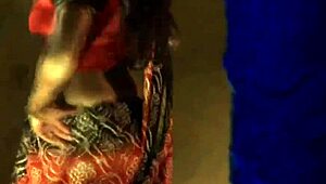 a warm indian babe lounges nude, showing natural tits and hairy body in softcore solo