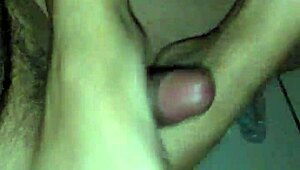 she gives a footjob until he cums on her pussy