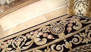 Zoey Holloway, sexy Euro MILF, sucks two cocks. Swallows double cum loads in wild action.