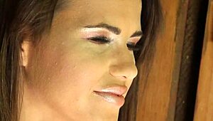 the teasing domina fingers her pussy outdoors