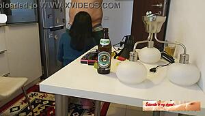 My cheatin wife fucks the plumber in the kitchen, bent over with her natural tits.