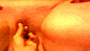 blonde babe teasingly masturbating alone in bed, building that sexy tension