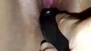 i'm watching my sister masturbate with a dildo, giving herself a sensual massage