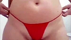 Mirella delicia strips and masturbates with dildo in exhibitionist scene.