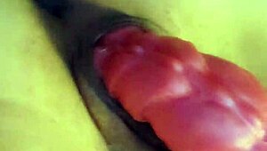 Petite teen masturbates with pink dildo to intense orgasm.