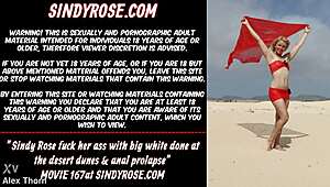 sindy rose drills her ass with big white dildo in desert dunes. anal prolapse exposed.