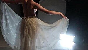 blonde ballerina dances gracefully in outdoor public setting