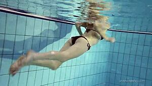 Nastya Bathes Naked in Public Pool