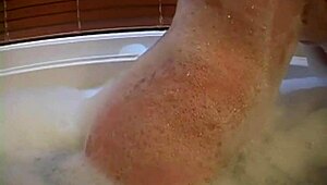 Barbi shows big tits in bubble bath!