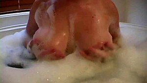 Barbi shows big tits in bubble bath!