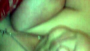 i give a handjob to a mature woman with huge tits