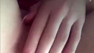 Beautiful blonde teases her big tits with nipple clamps and cums hard