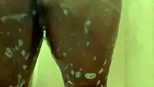 i'm enjoying a relaxing shower time with wet ebony skin