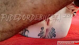 Hairy black stud fucks an ebony babe until she squirts big loads of cum