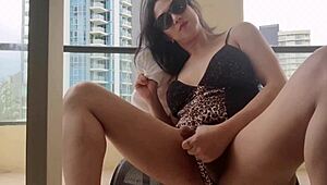 Hotel Balcony Show! Watch this ladyboy strip and masturbate outdoors.