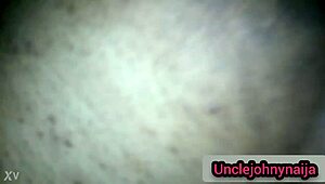 Unclejohny watches his ebony babe ride his black cock