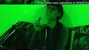 Hungarian goth mistress smokes in green light setting