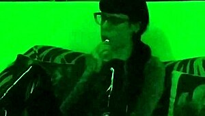 Hungarian goth mistress smokes in green light setting
