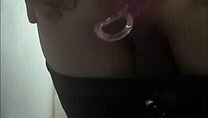 Sexy travesti plays with anal balls under clothes