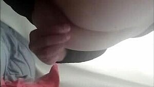 Sexy travesti plays with anal balls under clothes
