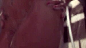 A cute babe with big boobs steps into the shower for a relaxing wash.