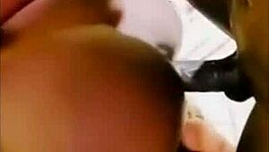 This ebony teen gets pounded by a huge black cock in doggystyle.