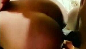 This ebony teen gets pounded by a huge black cock in doggystyle.