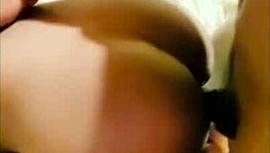 This ebony teen gets pounded by a huge black cock in doggystyle.