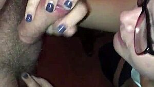 Sexy girl in glasses giving an amazing blowjob to a hard cock