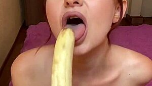 hot brunette sucking banana?
