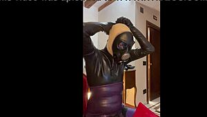 Wearing a tight gas mask for intense latex-rubber fetish play