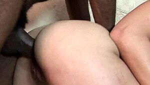 A big black cock cums all over a cute girl's ass