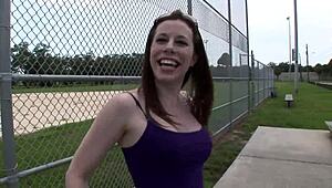 Beautiful woman engages in public outdoor activity during interview